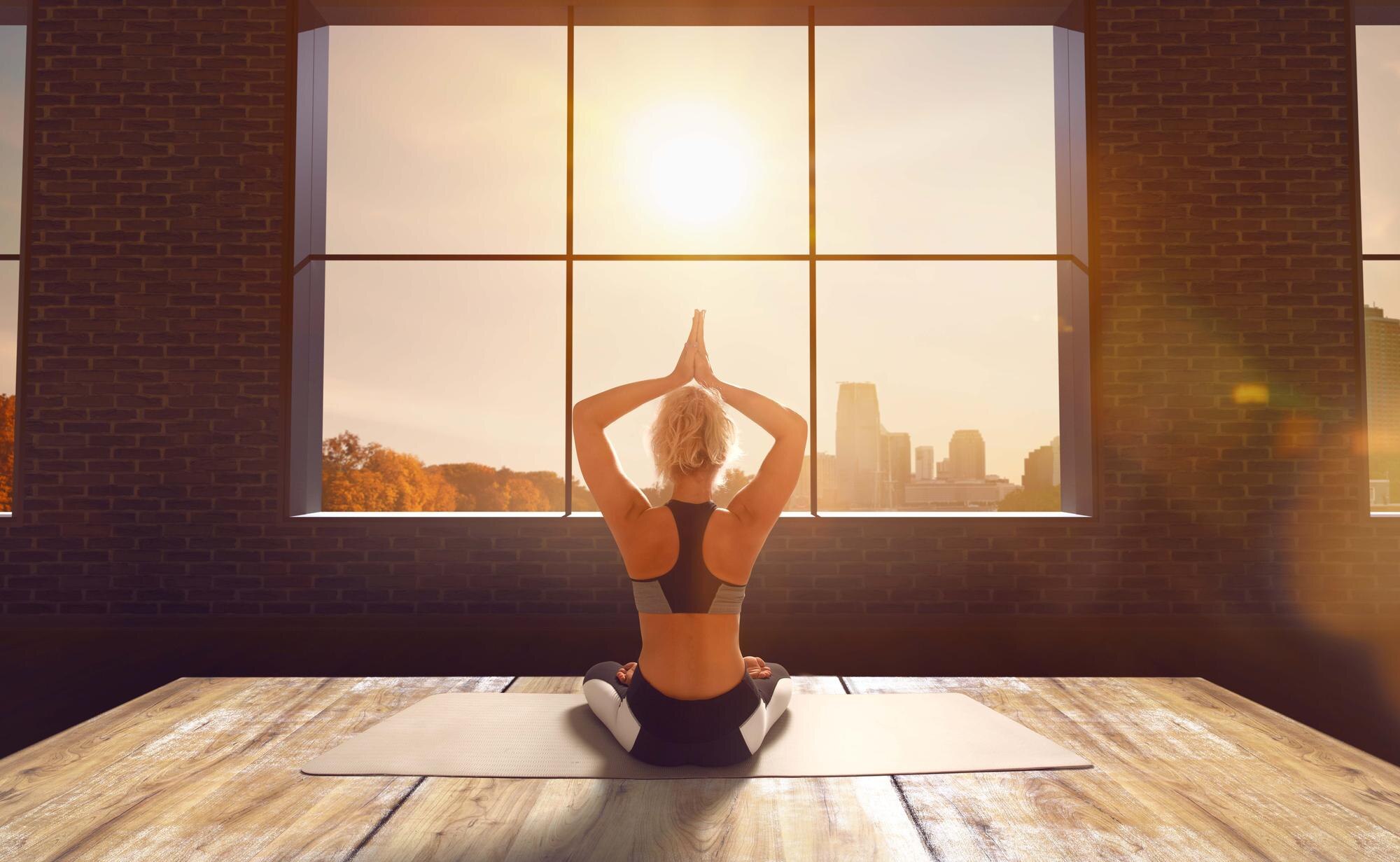 Morning stretching routine near a window